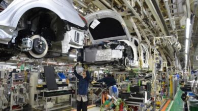 Japan Lowers Growth Forecast Amid Auto Export Slowdown